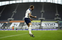 Tottenham's Harry Kane celebrates after scoring his side's opening goal during the English Premier League soccer match between Tottenham Hotspur and West Bromwich Albion at the Tottenham Hotspur Stadium in London, Sunday, Feb. 7, 2021. (AP Photo/Matt Dunham, Pool)