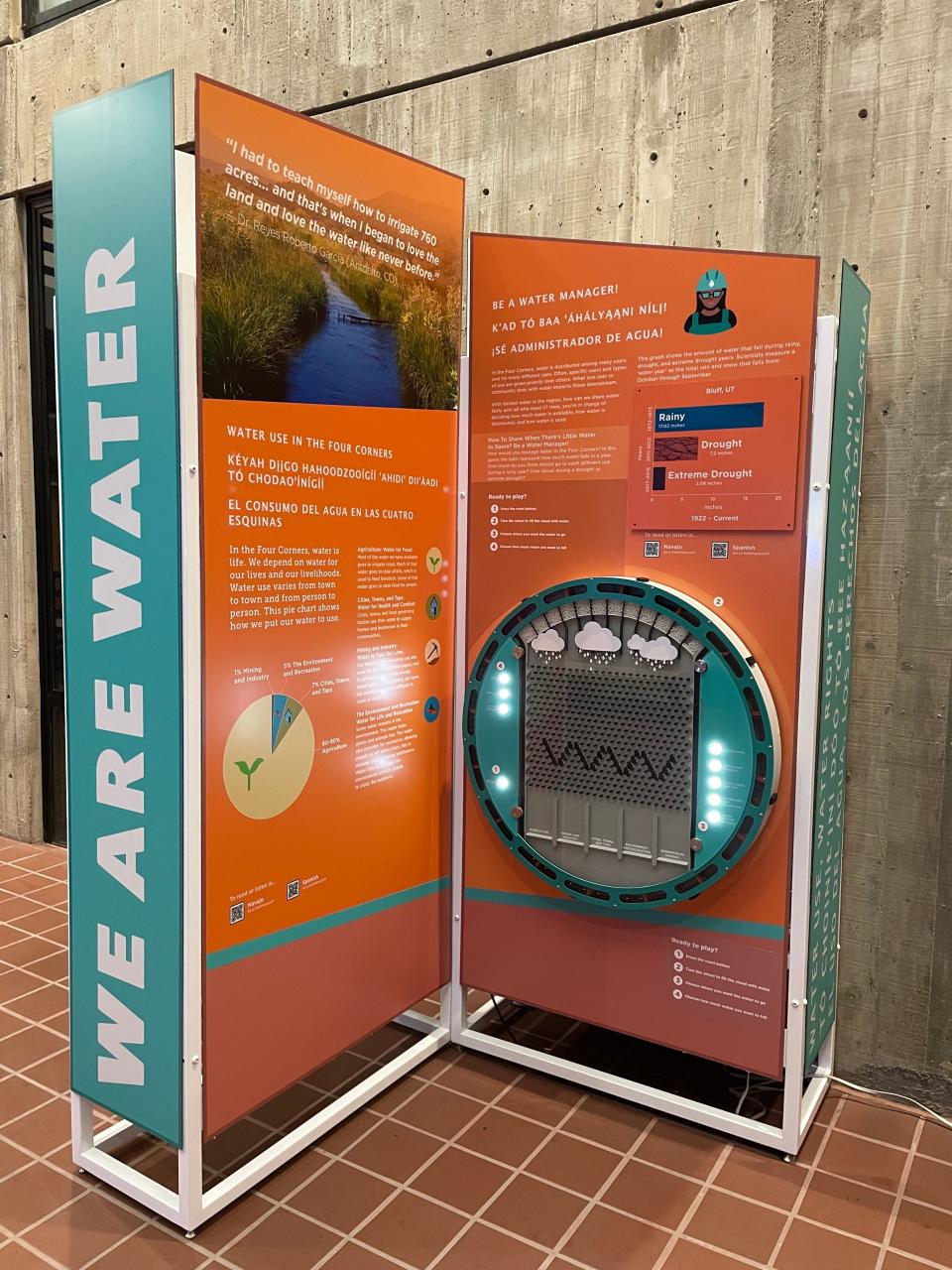 A water use plinko game is part of the "We Are Water" exhibition. Visitors can choose how they want water to be used and how much they want it to rain, and learn how decisions impact how much water is available for different types of water use.