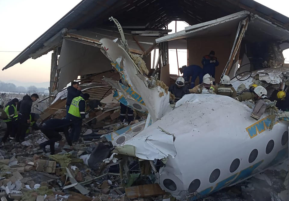 ALMATY, KAZAKHSTAN - DECEMBER 27, 2019: The site of a crash of a Bek Air plane carrying 95 passengers and 5 crew members near Almaty Airport. A Bek Air Fokker 100 passenger plane flying from Almaty to Nur-Sultan has crashed minutes after takeoff, broken through a concrete guardrail and clashed into a two-storey building. The accident has killed at least 14 people, dozens have been injured. The Press Office of the Committee for Emergency Situations of the Kazakhstan Interior Ministry/TASS (Photo by TASS\TASS via Getty Images)