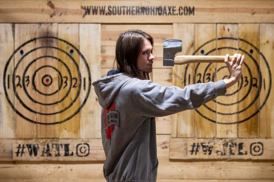 Wyatt Dawson, 27 and an employee at Southern Ohio Axe Throwing, in Portsmouth, practices throwing his axe at the target at the Southern Ohio Axe Throwing on Nov. 15, 2022 in Chillicothe, Ohio. Dawson will be competing in the World Axe Throwing Championship, the Hatchet Division, in Appleton, Wisconsin on December 2nd and 3rd, 2022. He will be competing against 256 of the worlds best axe throwers. The competition will air on the ESPN sports channel.