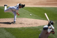 Chicago White Sox starting pitcher Lucas Giolito throws against Detroit Tigers batter Austin Romine during the third inning of a baseball game Thursday, Aug. 20, 2020, in Chicago. (AP Photo/Jeff Haynes)