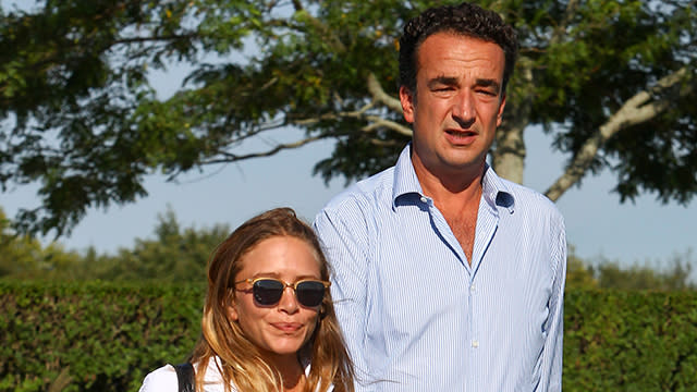 Looks like Mary-Kate Olsen and her much older man, French banker Olivier Sarkozy, are still going strong and not shy about showing some PDA. The couple was snapped at the 2015 Hampton Classic Horse Show in New York on Thursday, holding hands at the posh event. The 29-year-old former <em>Full House</em> actress looked like an equestrian herself in a white polo and khaki pants, while her 46-year-old fiance -- the half-brother of former French president Nicolas Sarkozy -- went casual in jeans and a striped button-down. Splash News <strong>WATCH: Mary-Kate and Ashley Olsen Talk 'Full House' Spinoff -- You Got It, Dude!</strong> Mary-Kate and Olivier first stepped out together in 2012, and reportedly got engaged in late February, though the notoriously private Mary-Kate has never confirmed any news about her personal life. Last September, <em>Lucky </em>magazine reported that the two had already tied the knot, citing an "anonymous, well-connected source," after they were spotted wearing matching thin gold wedding rings in the Hamptons. If true, it would mark Mary-Kate's first marriage and Olivier's second. He was previously married to author Charlotte Bernard, and has two children with his ex-wife -- son Julien, and daughter Margot. Mary-Kate actually talked about possibly designing her own wedding dress last May -- but stressed that there was no rush. "I’m, like, not even there yet," she told <em>WWD</em>. "I think it may be a matter of getting five or six or making two or three and being stressed out. That seems kind of far away. We’ll take one step at a time.” And it appears both Mary-Kate and twin sister Ashley are happily in love. Ashley also has a much older beau -- 48-year-old <em> Foxcatcher</em> director Bennett Miller -- who she reportedly started dating early last year. <strong>PHOTO: Ashley Olsen's Boyfriend Is Even Older Than Mary-Kate's</strong> But are we ready to see Mary-Kate and Ashley on the small screen again?! Last month, Netflix's chief content officer, Ted Sarandos, teased that the two are still "teetering on whether or not they'll be around" for the highly anticipated <em>Full House</em> reboot. Watch below: