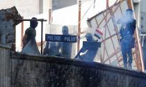 Members of Iraqi security forces are seen during ongoing anti-government protests in Baghdad