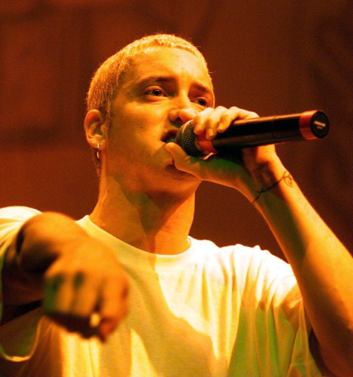 Detroit rapper Eminem performs in front of a packed State Theatre in Detroit on May 23, 1999.