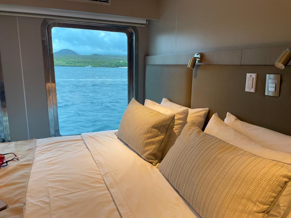 Evolve ship stateroom featuring large windows.