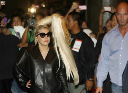 US singer Lady Gaga arrives at a hotel in Manila on May 19. Gaga is set to rock the Philippines later Monday amid planned street protests and with censors in the house on orders to report any hint of blasphemy, devil worship, nudity or lewd conduct