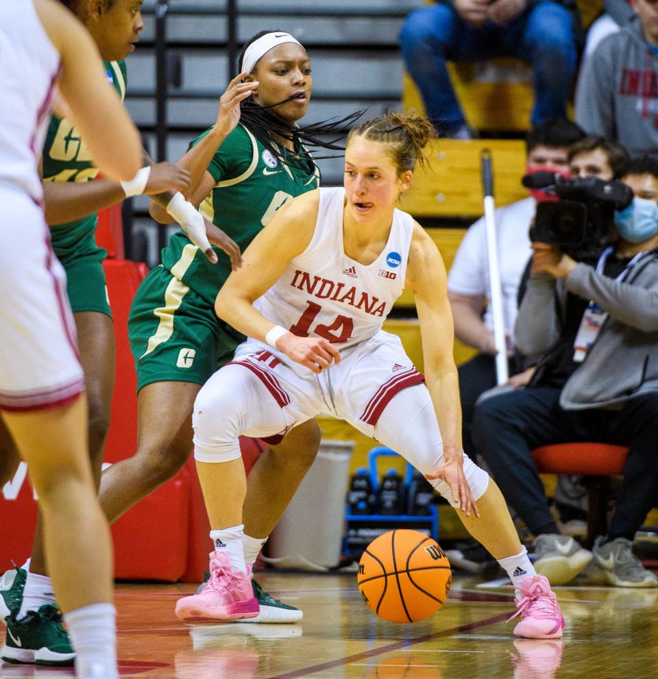 Indiana's Ali Patberg (14) works against Charlotte's Mikayla Boykin (12) during the first half of the Indiana versus Charlotte women's NCAA First Round game at Simon Skjodt Assembly Hall on Saturday, March 19, 2022.