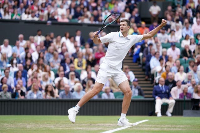 Hubert Hurkacz celebrates winning 