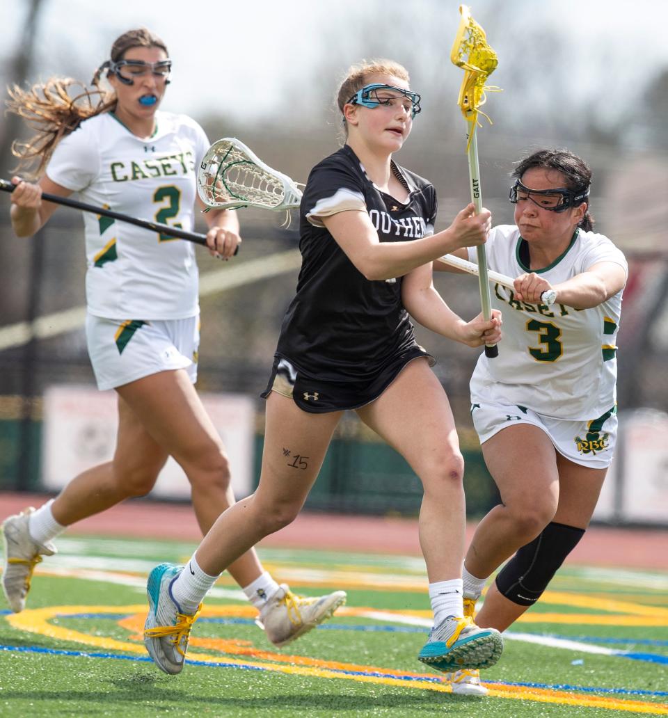 Southern Regional vs Red Bank Catholic girls lacrosse. Southernâ€™s Delaney Falk and RBCâ€™s Molly Malone. Red Bank, NJSaturday, April 9, 2022.