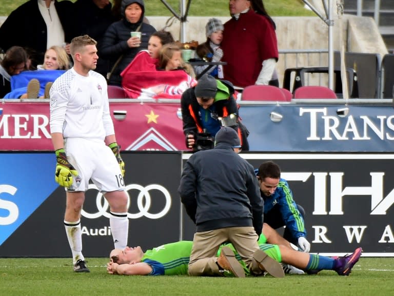 Jordan Morris of Seattle Sounders receives attention from staff in front of goaltender Zac MacMath of Colorado Rapids after an injury during his goal for a 1-0 lead at Dick's Sporting Goods Park on November 27, 2016