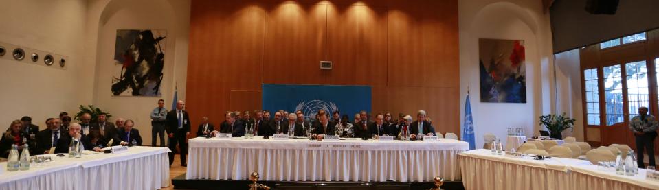 U.S. Secretary-General Ban Ki-moon (C) leads the opening of the Geneva-2 peace conference as Syria's Foreign Minister Walid al-Moualem (L front) leads his delegation while seats reserved for the Syrian opposition delegation are empty in Montreux January 22, 2014. Syria's government and its enemies came face to face for the first time on Wednesday at the one-day peace conference in Switzerland which world powers hope can at least start a process to end three years of civil war. (REUTERS/Jamal Saidi)