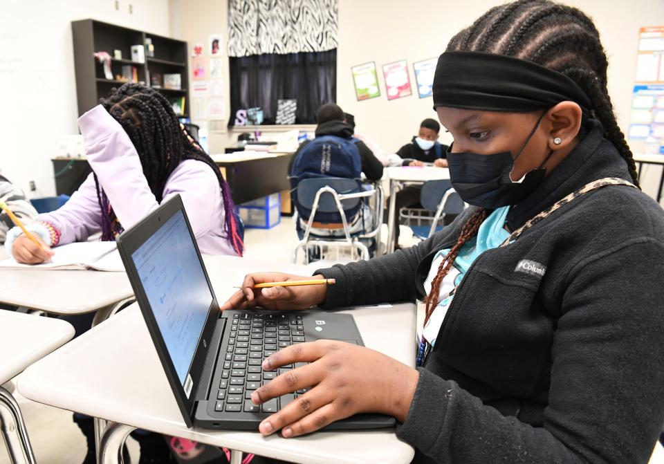 Zanaja Walker works on her computer in English class Thursday, March 3, 2022, at Westlawn Middle School in Tuscaloosa. The school was recently named a School of Character.