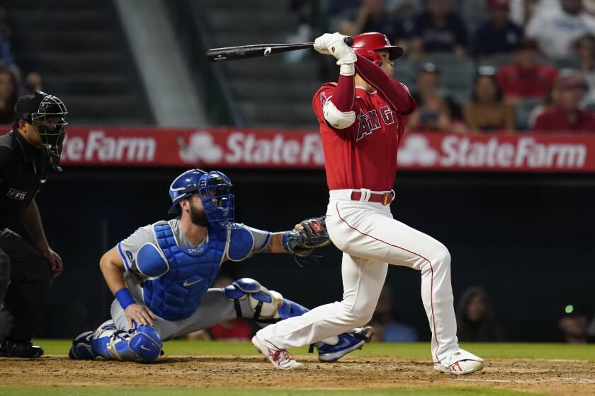 Los Angeles Angels designated hitter Shohei Ohtani (17) hits a home run during the sixth inning.