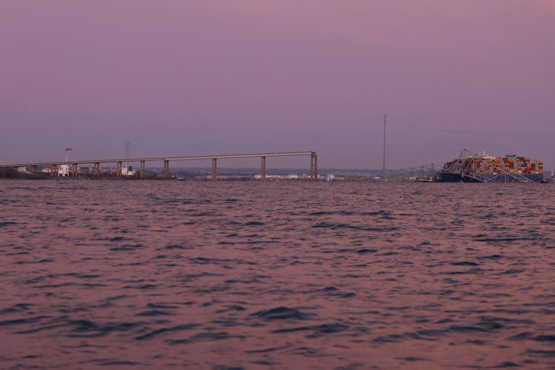 Emergency personnel work at the scene of the Francis Scott Key Bridge collapse in Baltimore