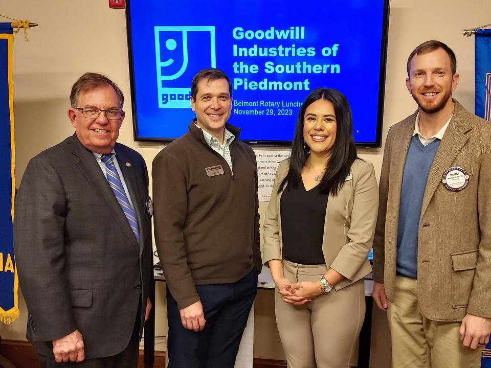 Goodwill Industries of the Southern Piedmont officials who recently spoke to the Belmont Rotary Club are (center) COO Jose Luis and Director of Regional Career Services Liz Romero. With them are Rotarians Don Hartsoe of Edward Jones, who hosted the program, (left) and Belmont Rotary President Thomas Hunter.