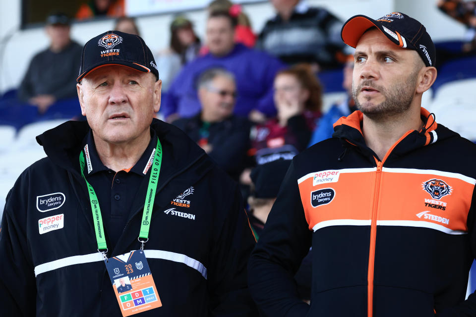 Wests Tigers head coach Tim Sheens next to Robbie Farah.