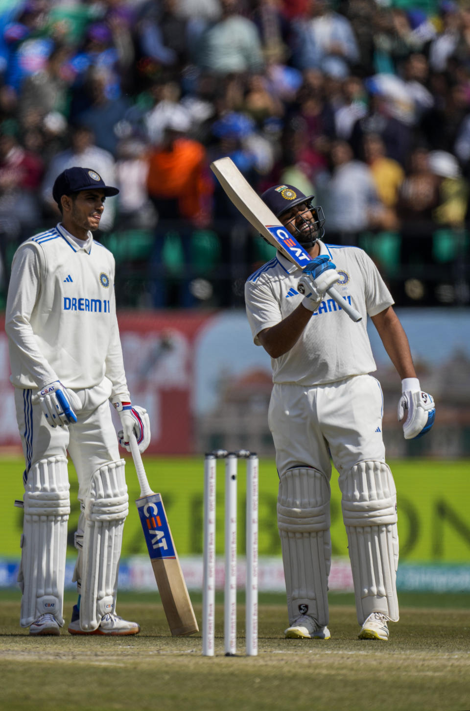 India's captain Rohit Sharma celebrates his hundred runs on the second day of the fifth and final test match between England and India in Dharamshala, India, Friday, March 8, 2024. (AP Photo/Ashwini Bhatia)