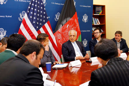 U.S. special envoy for peace in Afghanistan, Zalmay Khalilzad, (C) speaks during a roundtable discussion with Afghan media at the U.S Embassy in Kabul, Afghanistan January 28, 2019. U.S Embassy/ Handout via REUTERS