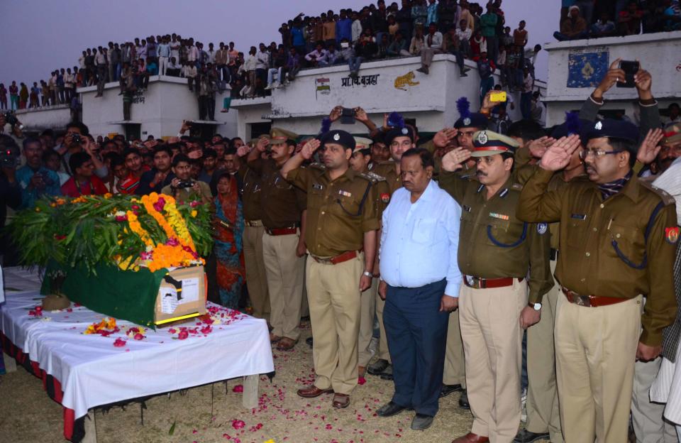 ALLAHABAD, INDIA - 2014/12/03: Family members and villagers mourn over the death of  CRPF soldier Mukesh Kumar who was killed in the Naxal attack in Chhattisgarh, at his residence Bajara village near Allahabad. About 15 CRPF people killed in a Maoist attack in Sukma district in Chhattisgarh. (Photo by Prabhat Kumar Verma/Pacific Press/LightRocket via Getty Images)