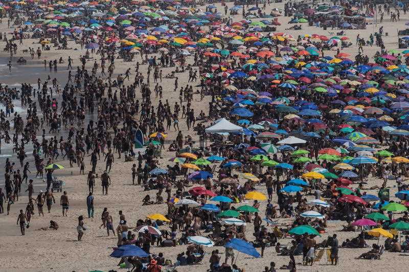 People visit the Ipanema beach in Rio de Janeiro, Brazil.