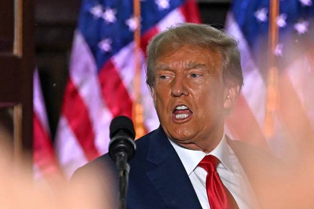 Former US president Donald Trump gestures after delivering remarks at Trump National Golf Club Bedminster in Bedminster, New Jersey, on 13 June 2023 (AFP via Getty Images)