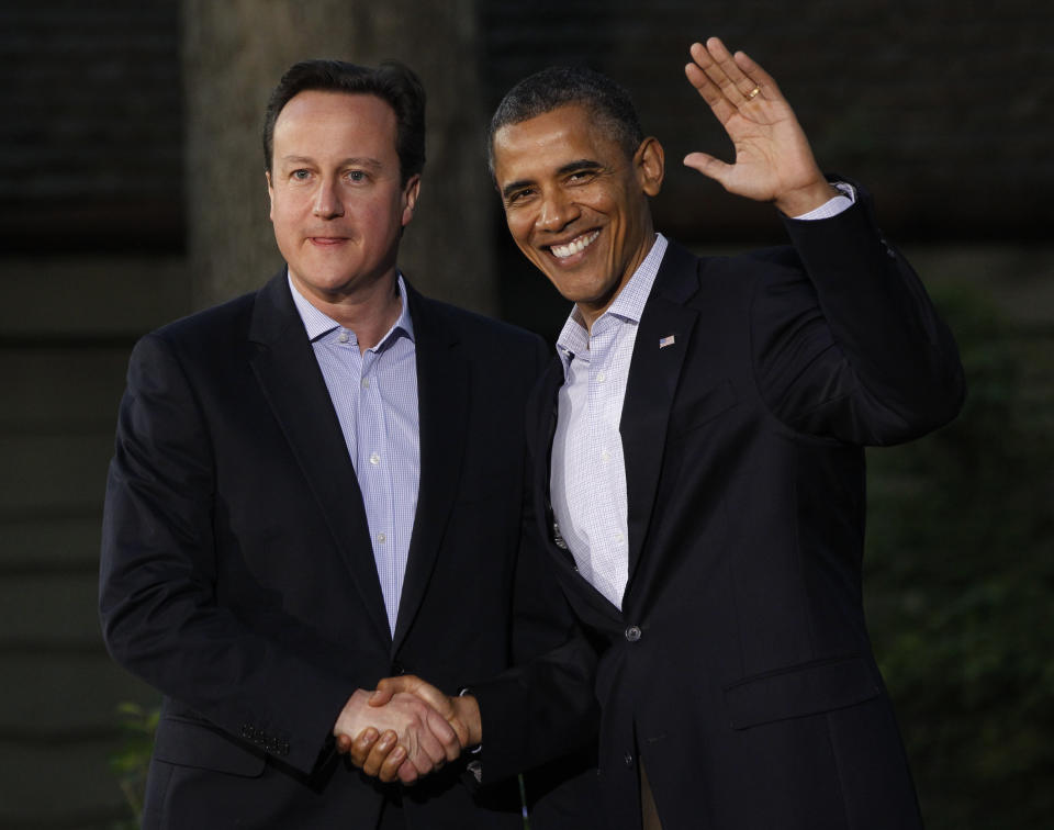 President Barack Obama shakes hands with Britain's Prime Minister David Cameron on arrival for the G8 Summit Friday, May 18, 2012 at Camp David, Maryland.