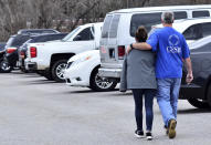 <p>Family members escort their children out of Marshal North Middle School near Palma, Ky., Jan. 23, 2018, after the students where transported from Marshal High School. (Photo: Stephen Lance Dennee/AP) </p>