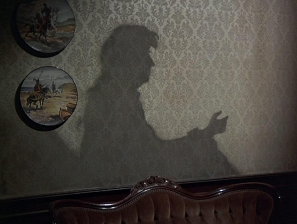 A shadow remains permanently etched on the wall in Night Gallery.