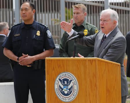 U.S. Attorney General Jeff Sessions speaks during a visit to the U.S. Mexico border wall for a press conference with Immigration and Customs Enforcement Deputy Director Thomas D. Homan, discussing immigration enforcement actions of the Trump Administration near San Diego, California, U.S. May 7, 2018. REUTERS/Mike Blake