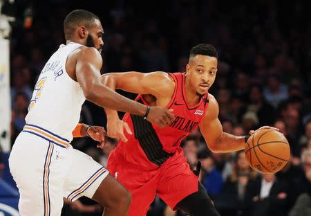 Nov 20, 2018; New York, NY, USA; Portland Trail Blazers guard CJ McCollum (3) dribbles the ball against New York Knicks guard Tim Hardaway Jr. (3) during the second half at Madison Square Garden. Mandatory Credit: Andy Marlin-USA TODAY Sports