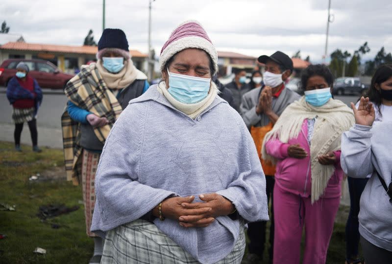 Family members of inmates wait for information on their loved ones, after a riot at the penitentiary Cotopaxi No 1, in Latacunga