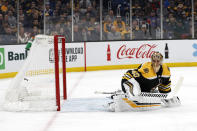 Boston Bruins goaltender Tuukka Rask looks back to see a shot by Tampa Bay Lightning's Anthony Cirelli score for a shorthanded goal during the first period of an NHL hockey game Saturday, March 7, 2020, in Boston. (AP Photo/Winslow Townson)
