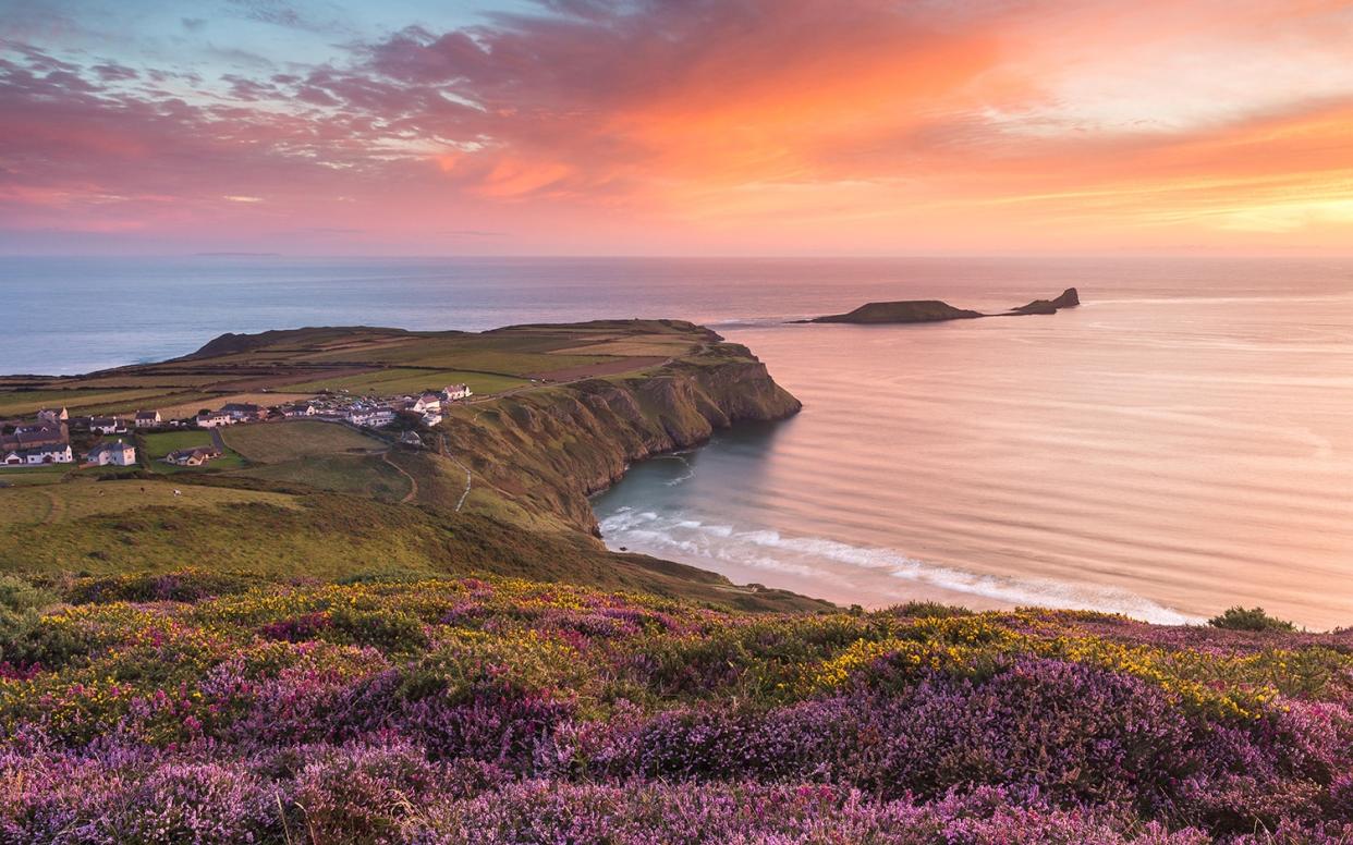 Gower’s Rhossili beach was ranked the best in Britain in 2014 and the ninth best in the world - Alamy