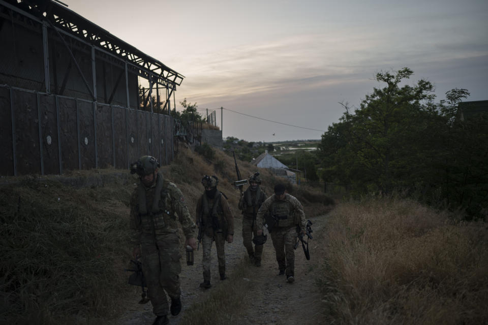 Ukraine Special Operations Forces return from a night mission in Kherson region, Ukraine, Saturday, June 10, 2023. (AP Photo/Felipe Dana)