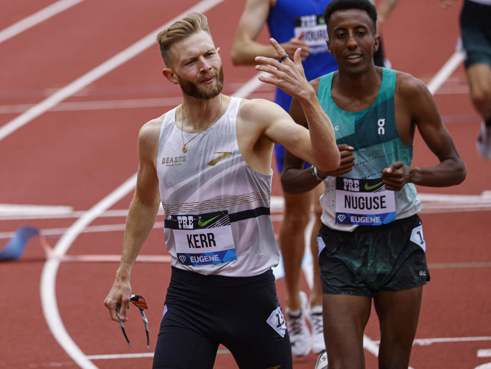 Josh Kerr, of Scotland, gestures after winning the men's mile during the Prefontaine Classic track and field meet Saturday, May 25, 2024, in Eugene, Ore. (AP Photo/Thomas Boyd)