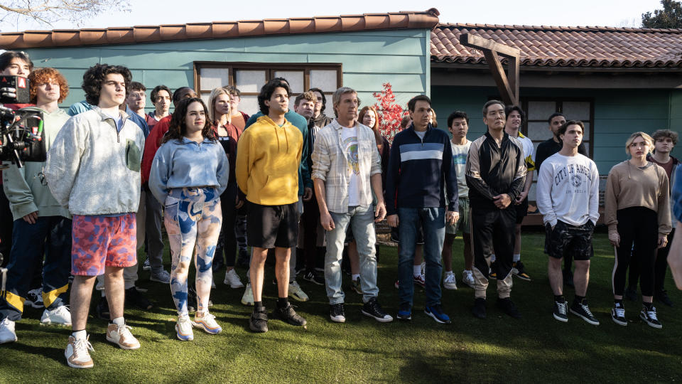 Cobra Kai. (L to R) Griffin Santopietro as Anthony LaRusso, Mary Mouser as Samantha LaRusso, Xolo Maridueña as Miguel Diaz, William Zabka as Johnny Lawrence, Ralph Macchio as Daniel LaRusso, Nathaniel Oh as Nate, Yuji Okumoto as Chozen Toguchi, Tanner Buchanan as Robby Keene, Peyton List as Tory Nichols in Cobra Kai. 