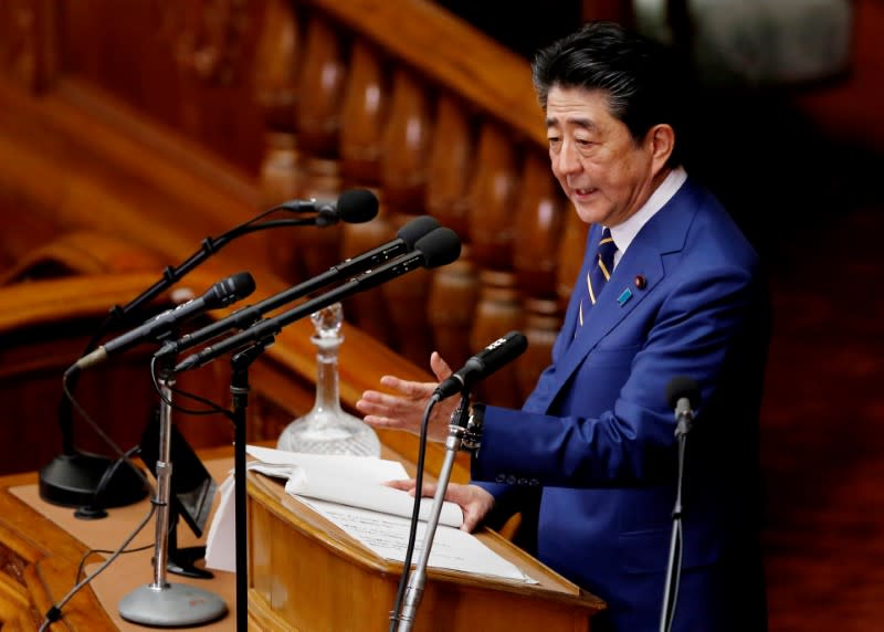 Japanese Prime Minister Shinzo Abe gives a policy speech at the start of the regular session of parliament in Tokyo