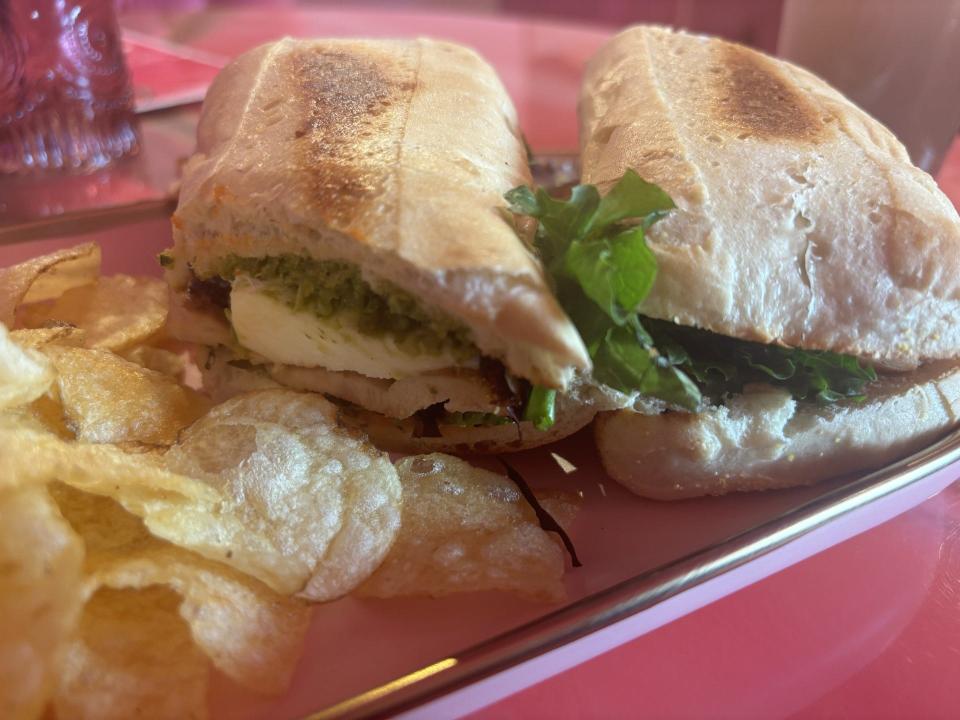 Amo Cafe offers a variety of tasty sandwiches including the McKenzie, $15, a chicken breast sandwich in homemade artisan bread with a Neapolitan sauce, fresh basil and parmesan cheese. The sandwich sides are chips or fruit salad.