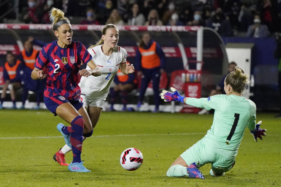 Czech Republic goalkeeper Barbara Votikova, right, stops a shot from United States' Trinity Rodman (2) during the second half of a She Believes Cup soccer match Thursday, Feb. 17, 2022, in Carson, Calif. (AP Photo/Marcio Jose Sanchez)