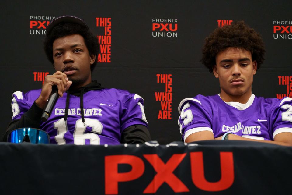 Cesar Chavez's Keivon Davis (left) and M.J. Woodberry attend Phoenix Union High School District Football Media Day at the district building in Phoenix on Aug. 21, 2023. Davis speaks on the death of teammate Christopher Hampton and how the team is recovering from the tragedy.