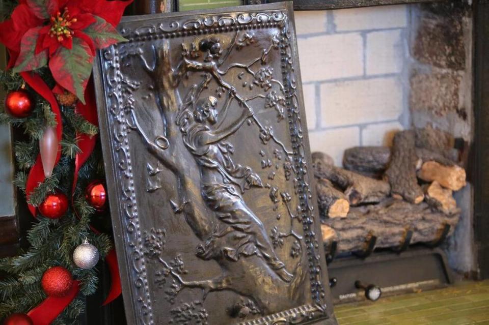Etched metal covers decorate themany fireplaces at the Redding House in Biloxi.