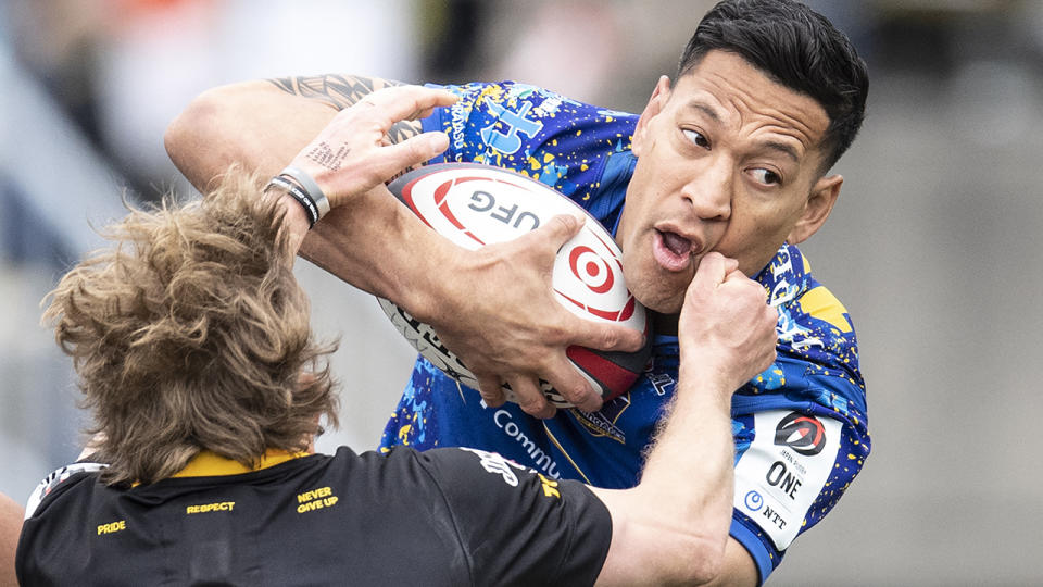 Israel Folau is tackled by an opponent.