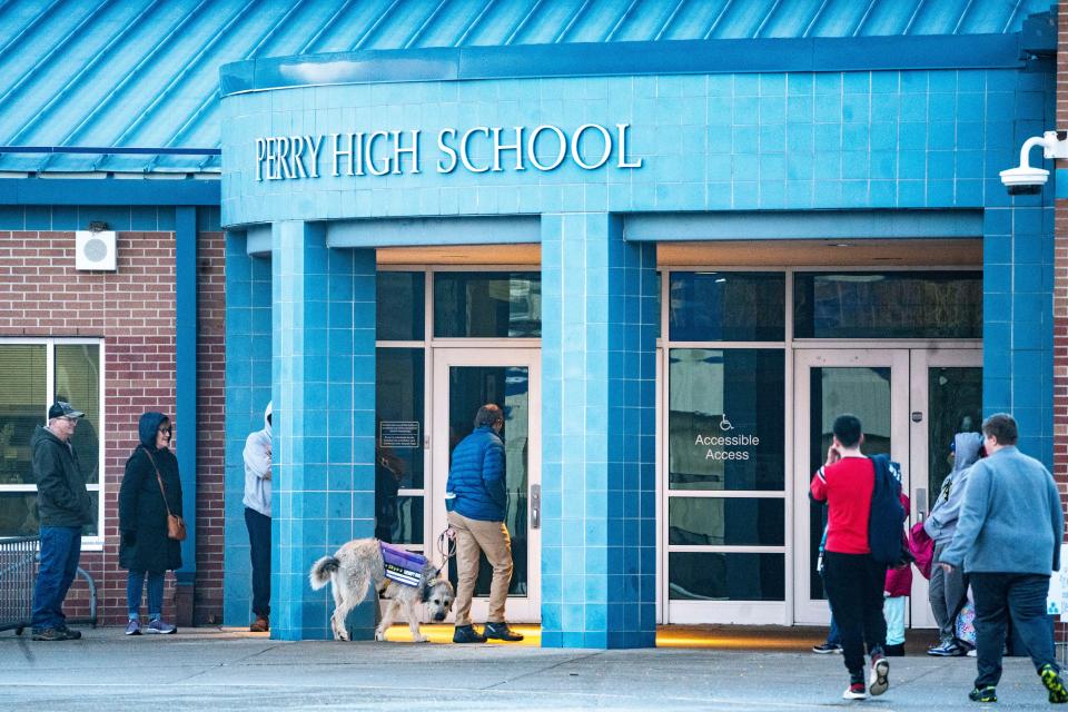 Students arrive on the first day of school at Perry High School after the Jan. 4 shooting on Wednesday, Jan. 31, 2024, in Perry.