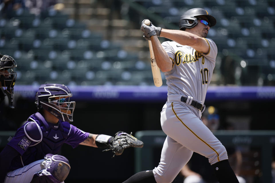 Pittsburgh Pirates' Bryan Reynolds connects for a solo home run off Colorado Rockies starting pitcher Jon Gray in the first inning of a baseball game Wednesday, June 30, 2021, in Denver. (AP Photo/David Zalubowski)