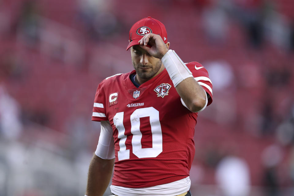 San Francisco 49ers quarterback Jimmy Garoppolo (10) walks off the field after the 49ers were defeated by the Arizona Cardinals in an NFL football game in Santa Clara, Calif., Sunday, Nov. 7, 2021. (AP Photo/Jed Jacobsohn)