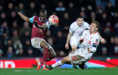 Football Soccer- West Ham United v Liverpool - FA Cup Fourth Round Replay - Upton Park - 9/2/16 West Ham's Enner Valencia is challenged by Liverpool's Lucas Leiva Reuters / Eddie Keogh Livepic EDITORIAL USE ONLY.