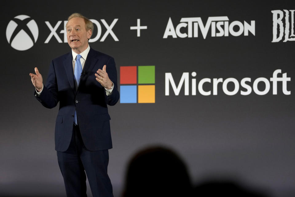 Microsoft President Brad Smith addresses a media conference regarding Microsoft's acquisition of Activision Blizzard and the future of gaming in Brussels, Tuesday, Feb. 21, 2023. (AP Photo/Virginia Mayo)