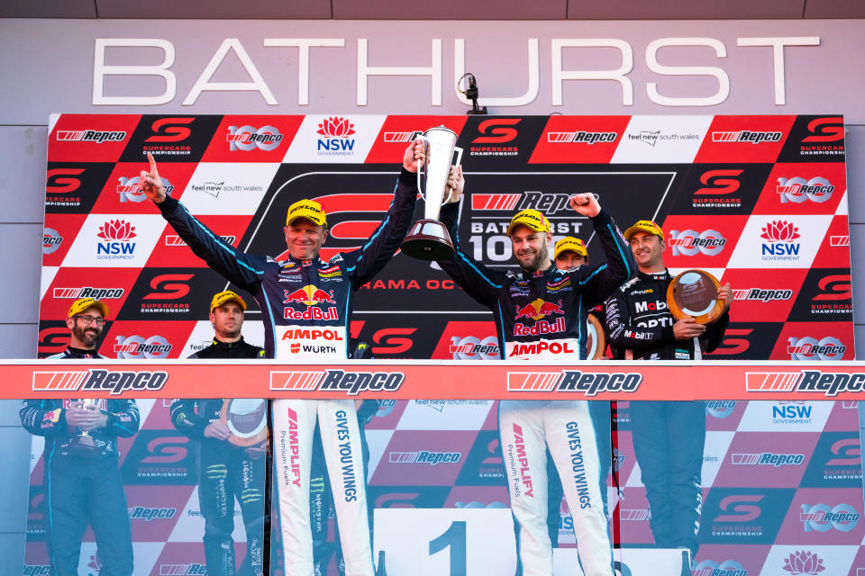 Shane van Gisbergen (pictured right) and Garth Tander (pictured left) celebrate after winning the Bathurst 1000. 