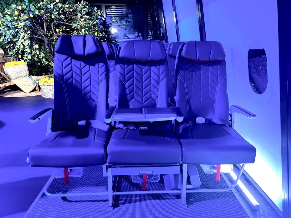 Three business class seats on a mockup cabin for British Airways short-haul at a showcase event in London
