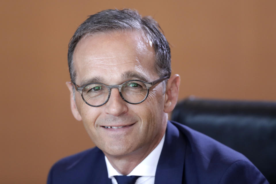 FILE - In this July 18, 2018 file photo German Foreign Minister Heiko Maas smiles prior to the weekly cabinet meeting at the chancellery in Berlin, Germany. Maas is setting out proposals for what he calls a future “balanced partnership” with the United States that would include setting up channels for financial payments which are independent of the U.S. (AP Photo/Ferdinand Ostrop, file)